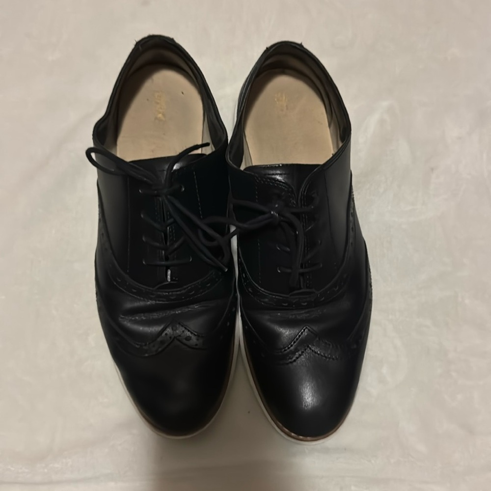 used black leather Cole Haan shoes